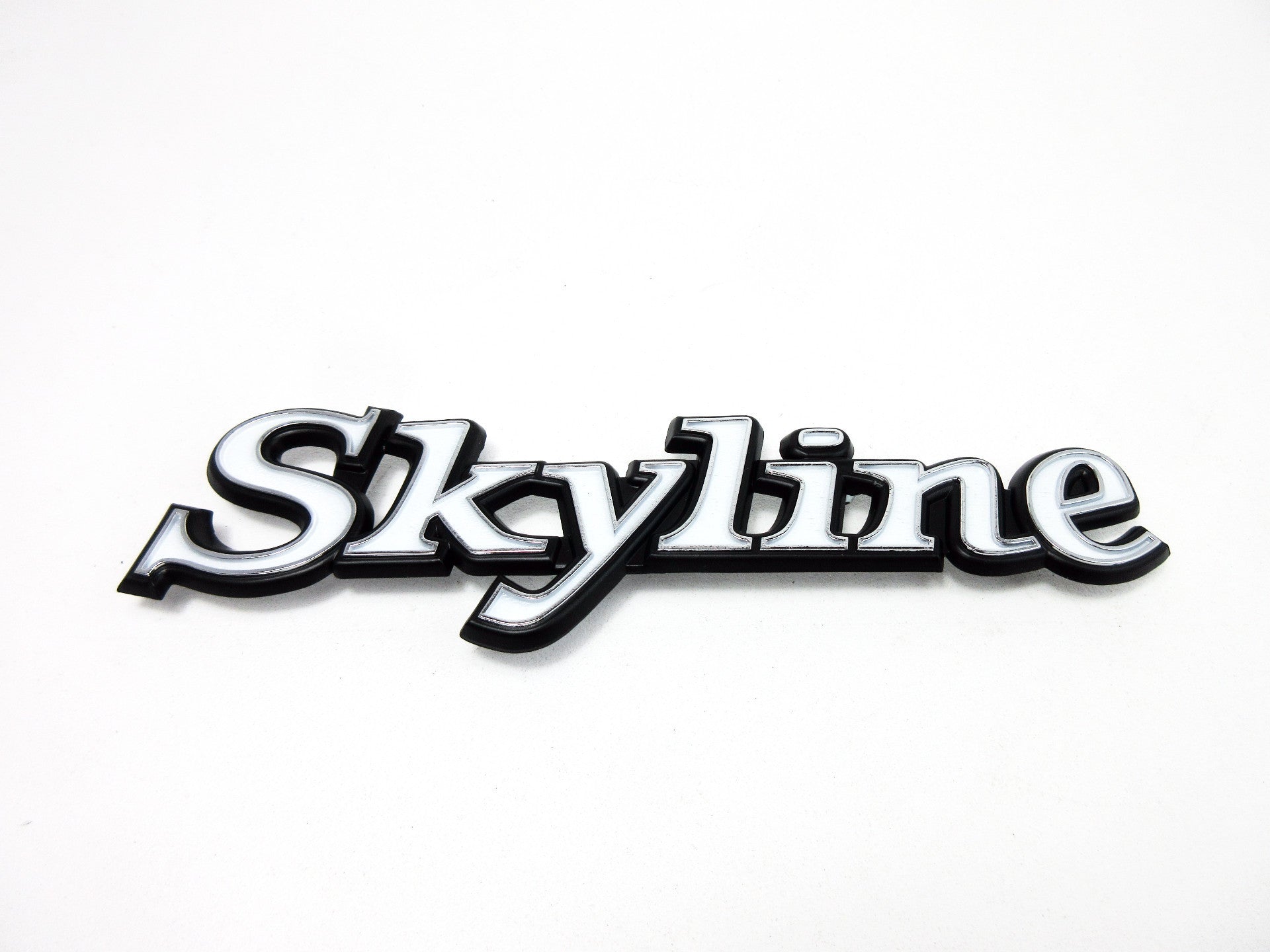 Nissan Skyline Kenmeri Rear side emblem Genuine Nissan NOS – JDM