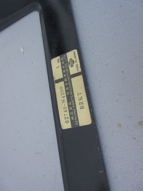 Datsun 280Z Canadian Model Front License Plate Mount Genuine