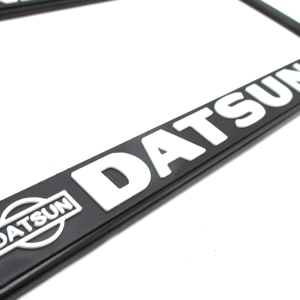 
                      
                        Gardena Datsun License Plate Frame Reproduction
                      
                    