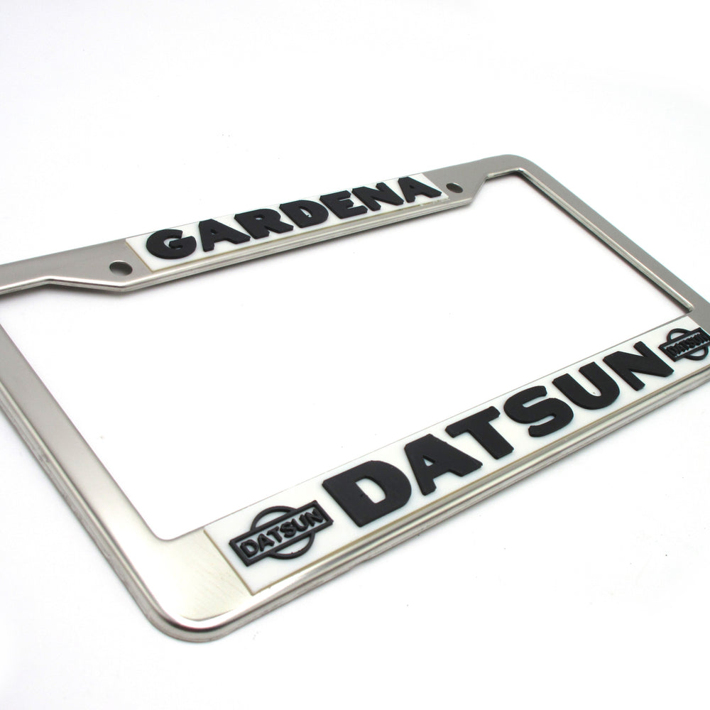 
                      
                        Gardena Datsun License Plate Frame Reproduction
                      
                    