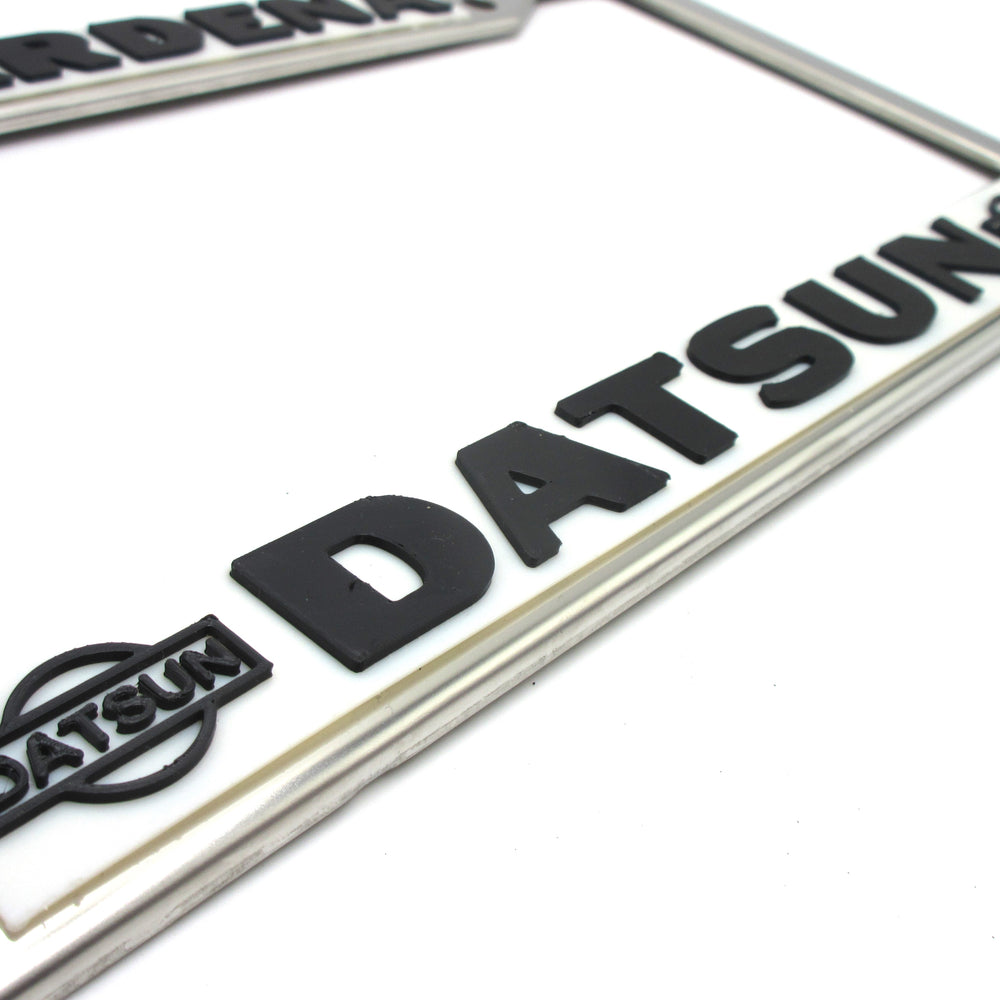 
                      
                        Gardena Datsun License Plate Frame Reproduction
                      
                    