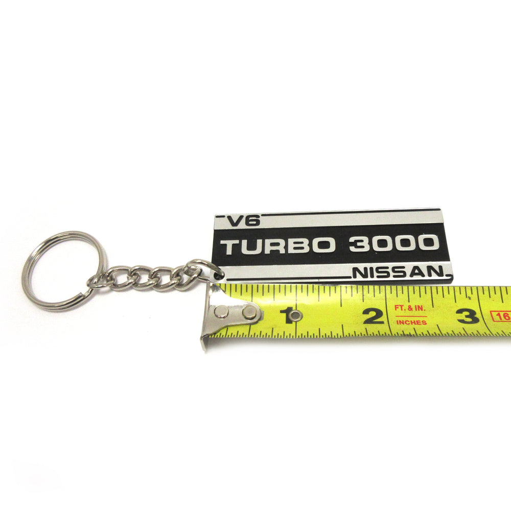 
                      
                        Datsun / Nissan 300ZX Z31 Valve Cover Key Chain Aluminum Black Anodized Finish
                      
                    