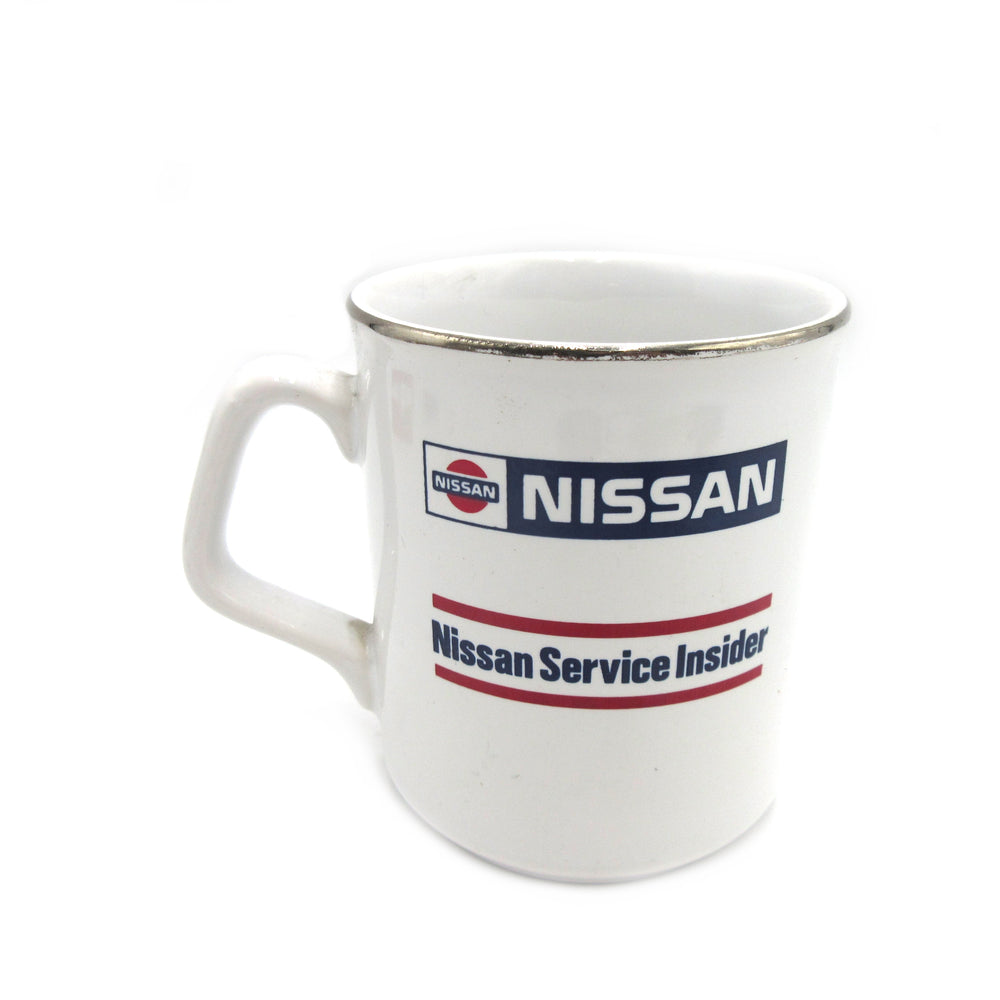 
                      
                        Vintage Complementary Mug Cap for "Special Guest" Nissan Motor Corp. in USA Nissan Service Insider NOS
                      
                    