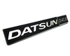 "Datsun 240Z" glove box / dash emblem
