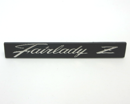 "Fairlady Z" glove box / dash emblem