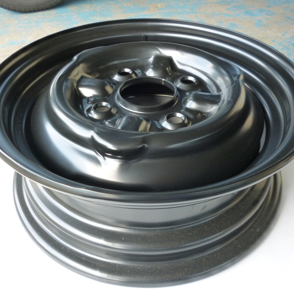 
                      
                        Stock Steel Wheels Set for Toyota Sports 800 NOS
                      
                    